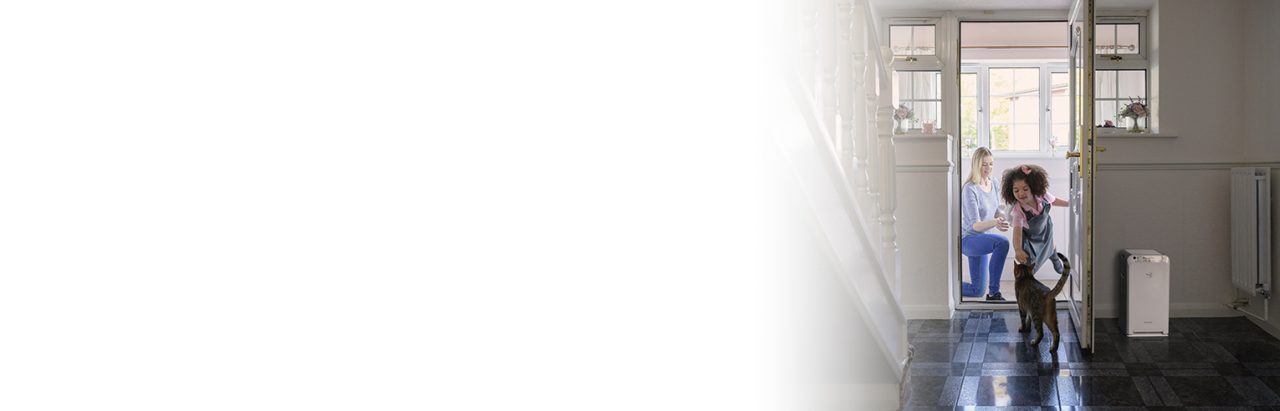 Mother and daughter in door