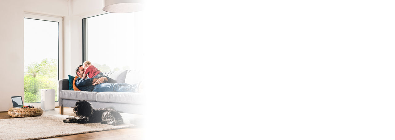 Father and child in sofa